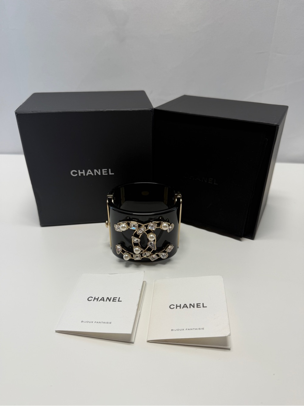 CHANEL Black Resin CC Cuff with Gold-Tone Logo and Pearls